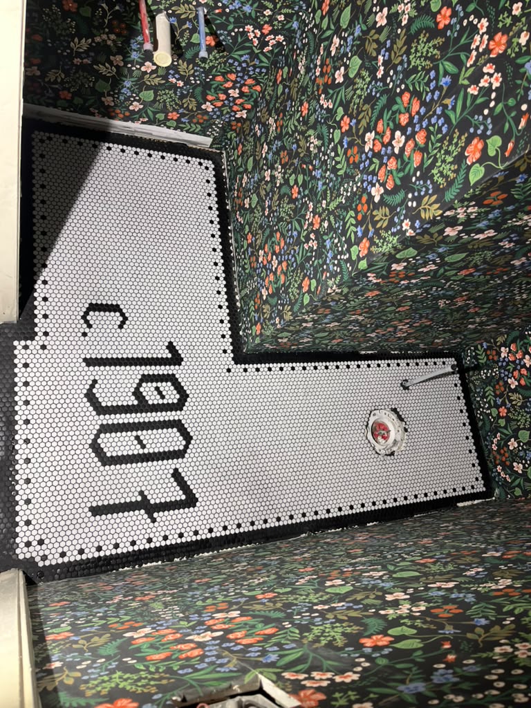 Custom penny tile bathroom floor detail