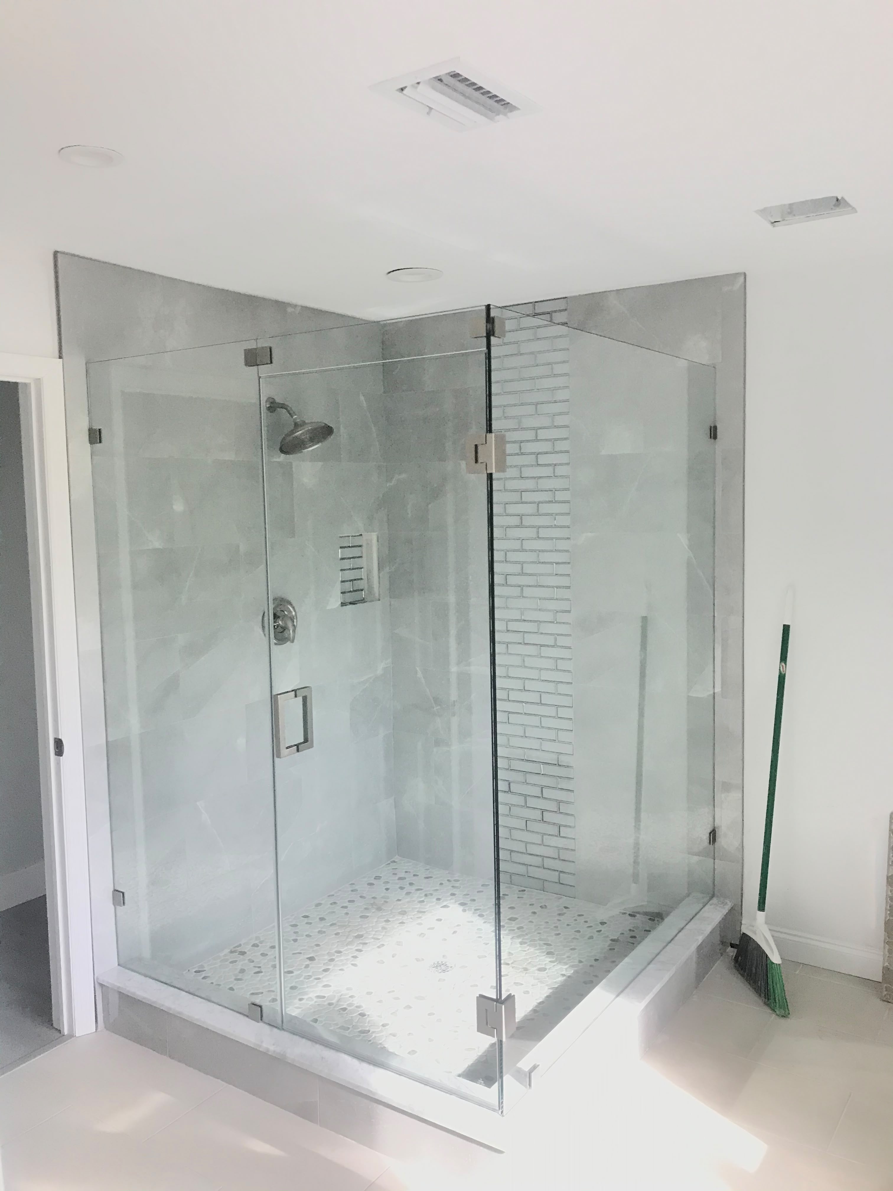 Detailed frameless shower renovation by FLO