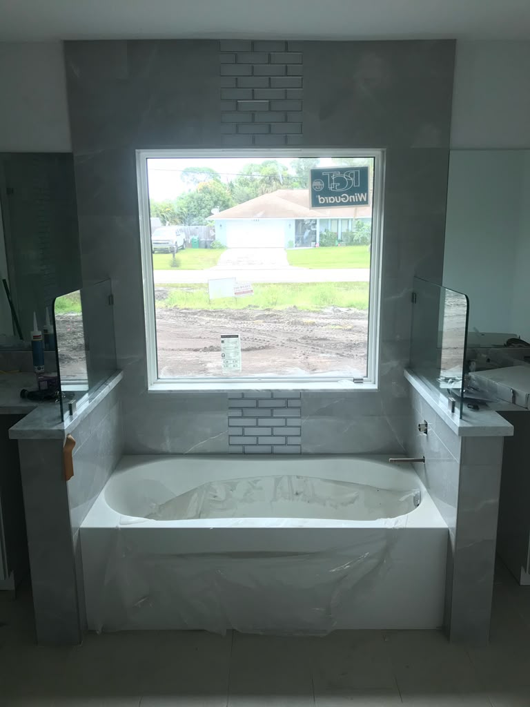 Tiled bathtub surround with feature window